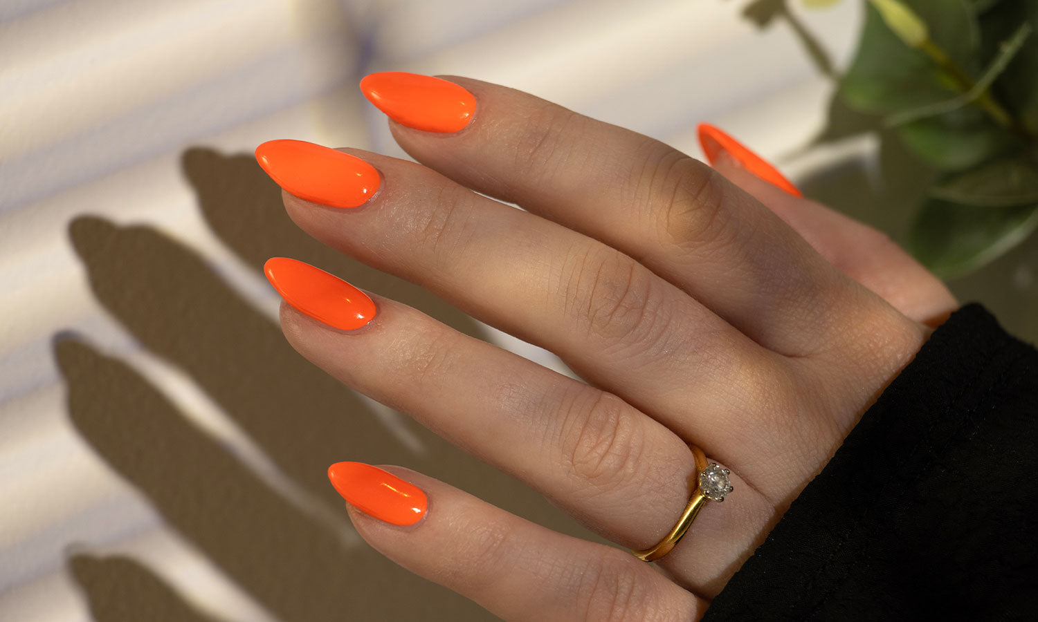 Gelous Neon Tangelo Gel Nail Polish - photographed in United Kingdom on model